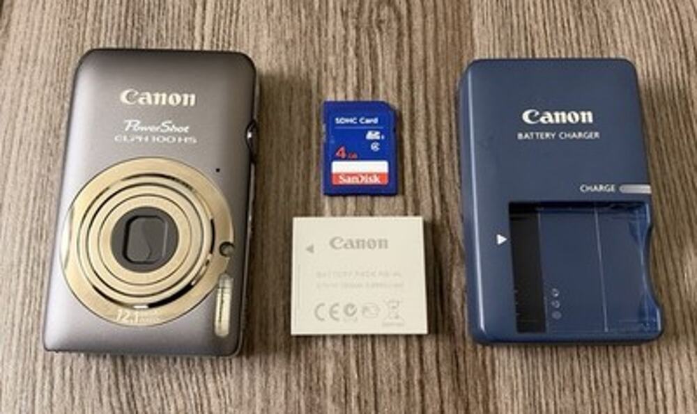 Canon PowerShot ELPH 100 HS 12.1MP Digital Camera w/ Battery, Charger, & SD Card